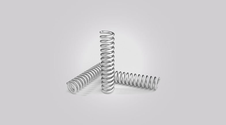 Image of a large heavy duty compression spring for industrial use
